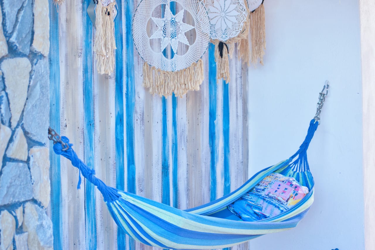 Amaca zona relax esterna casa vacanze Procida patio ombreggiato