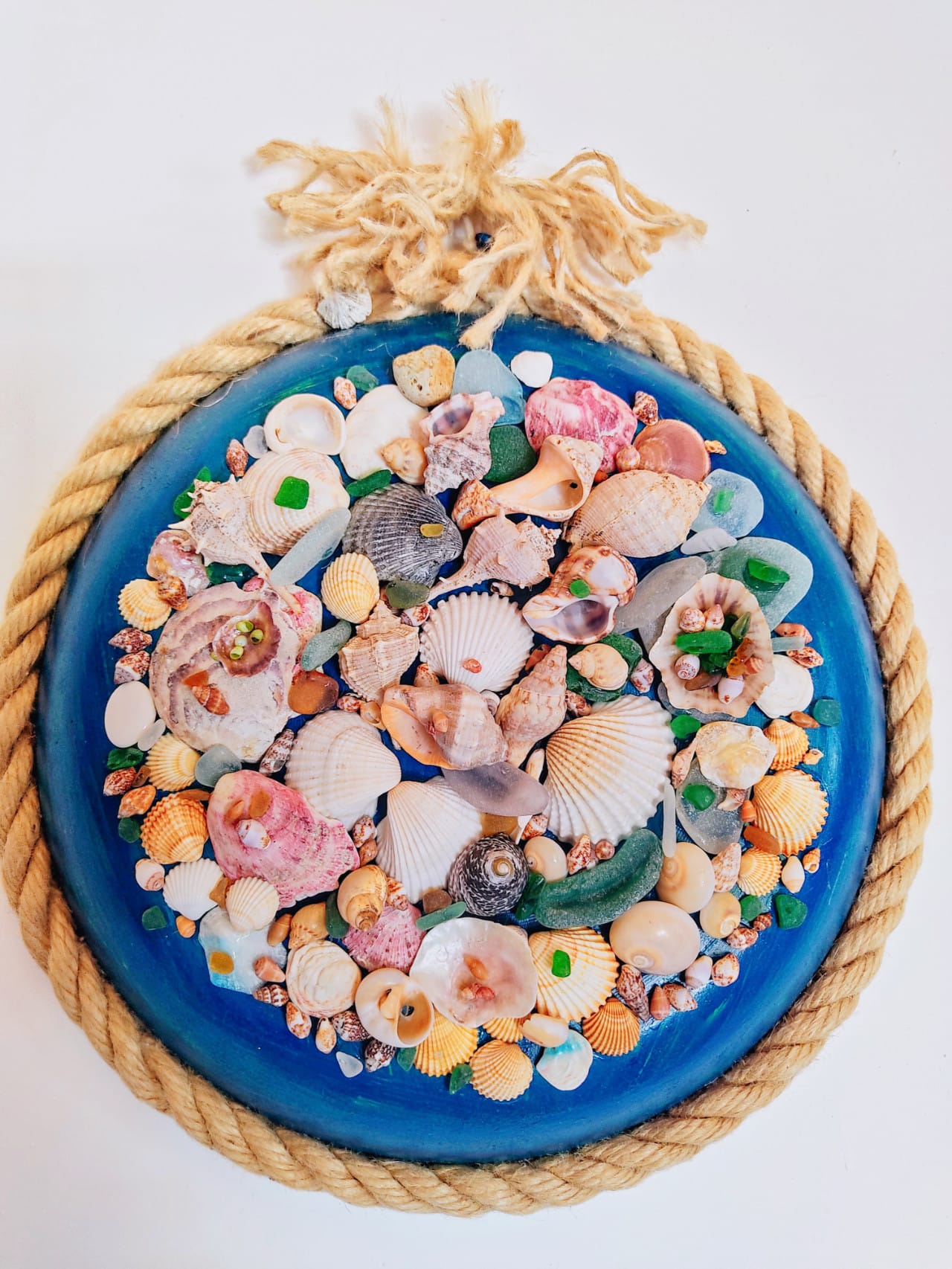 Angolo esterno arredato casa vacanze Procida con pergolato ombreggiato